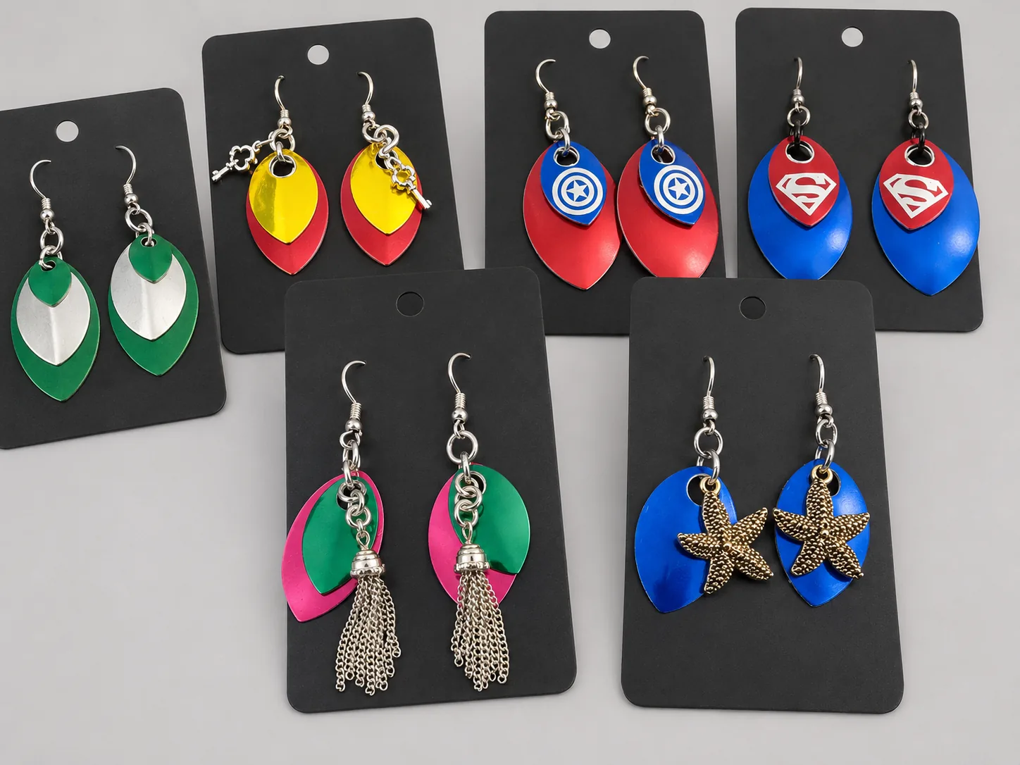Colorful scale earrings with charms and layered designs