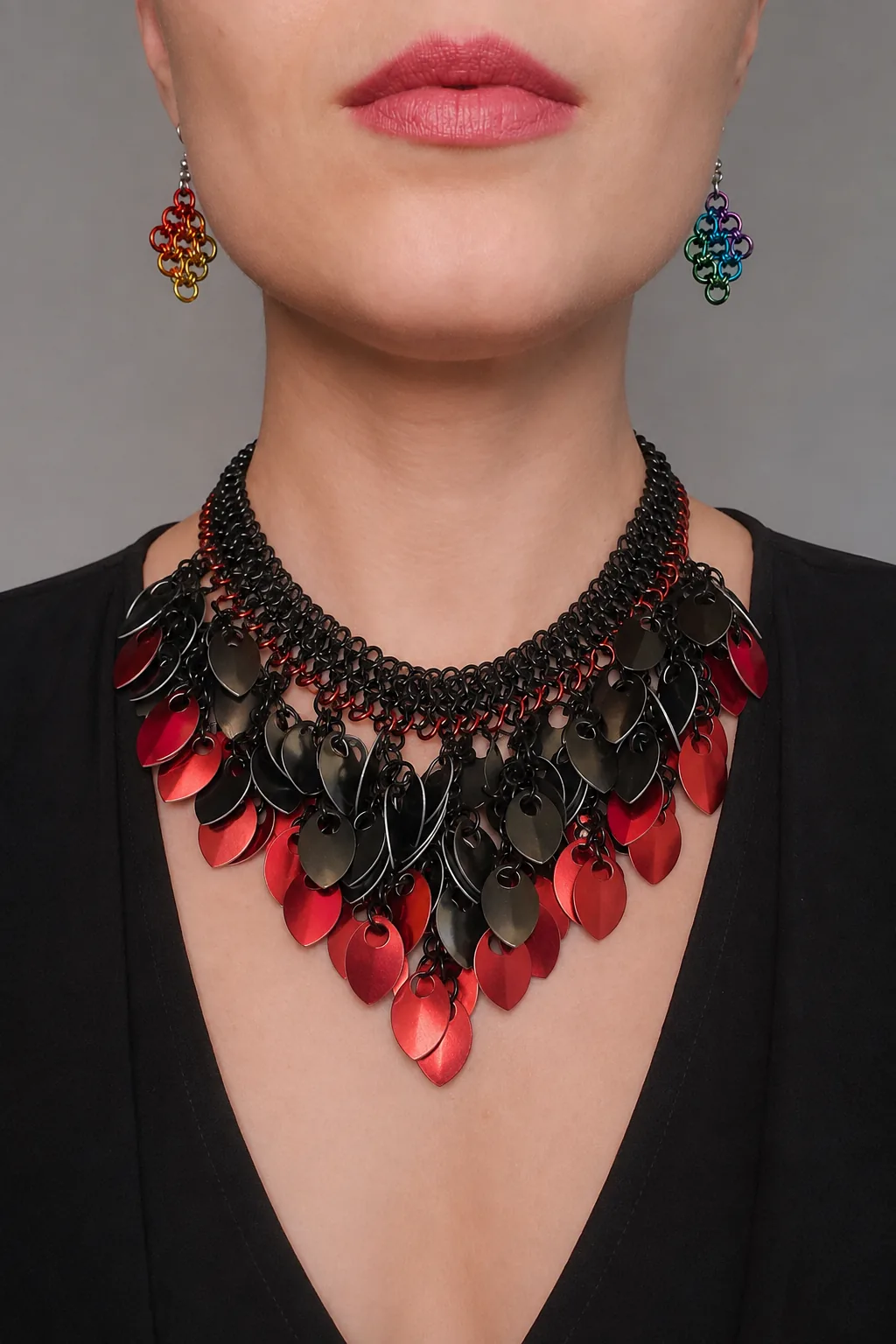 Elemental Leaves necklace in black and red on the studio model