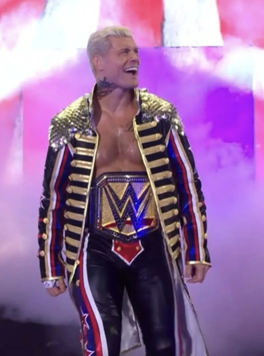 Cody Rhodes wearing an entrance coat with gold scale shoulder detailing